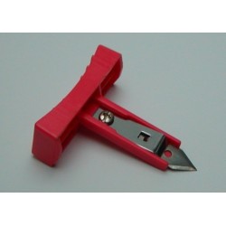 Plastic holder with cutter